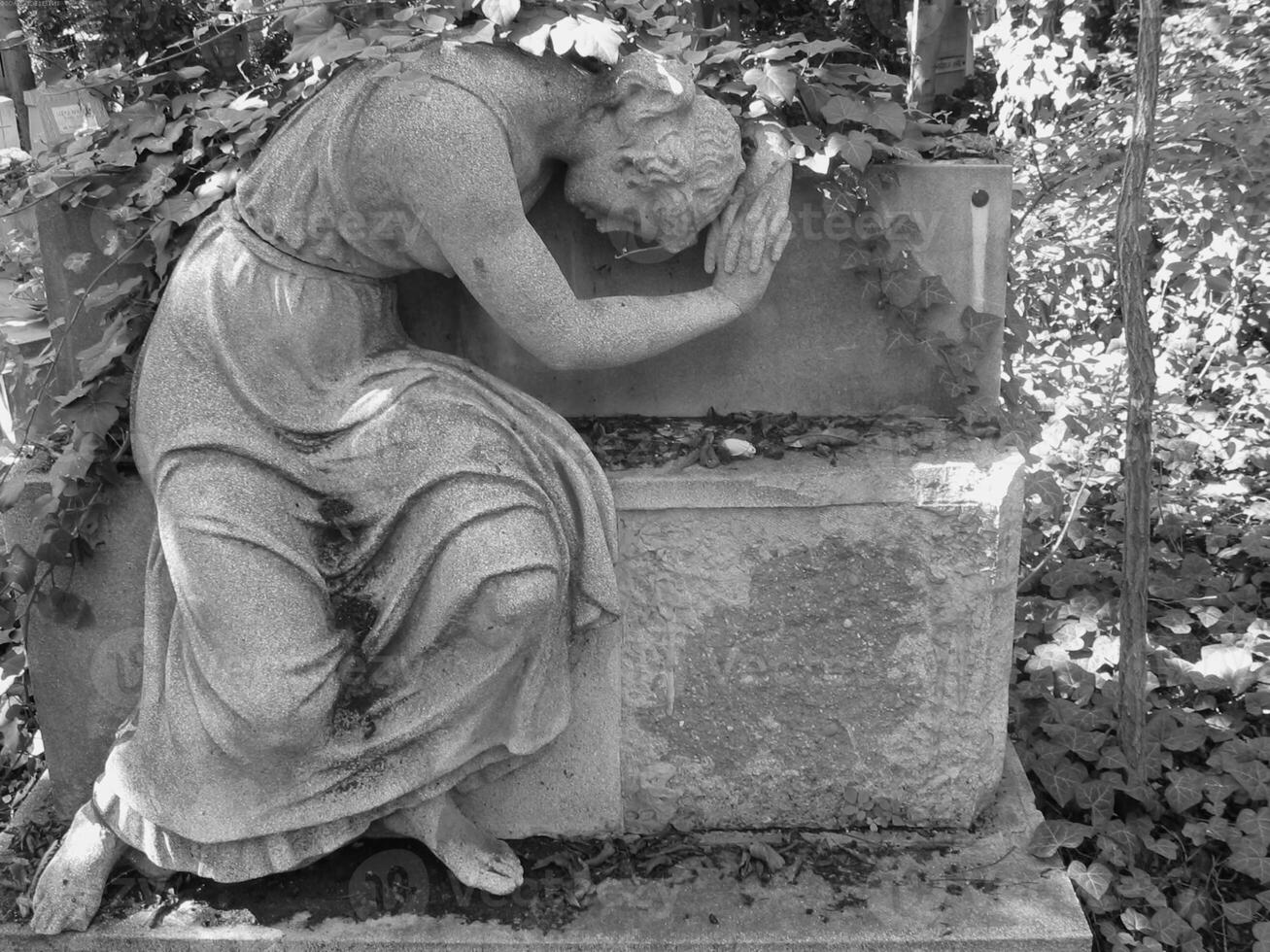 Sculpture close view background. Monument art. Black and white monochrome grayscale photo