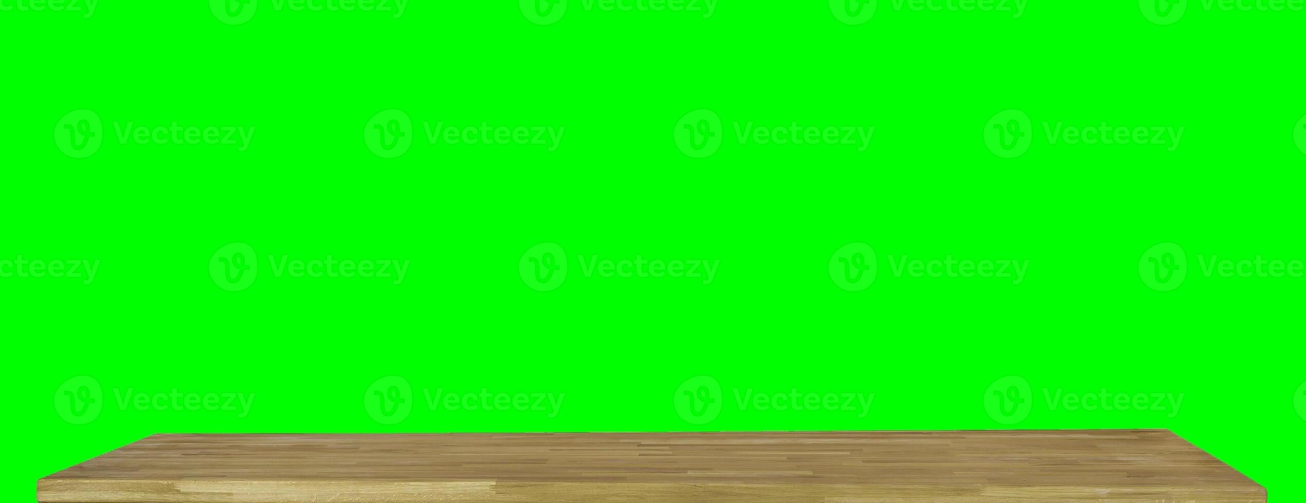 Wooden dinner table surface. Natural wood furniture close view. Tabletop isolated over green screen chroma key background photo