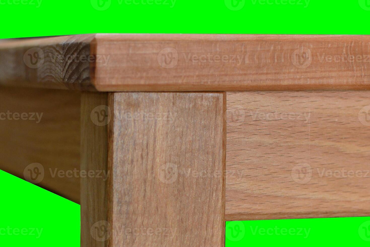 Wooden table surface. Natural wood furniture close view. Table isolated over green screen chroma key background photo