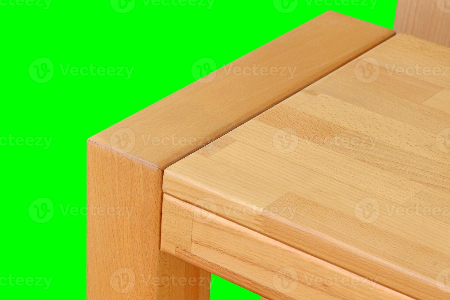 Wooden bench surface. Natural wood furniture close view. Table isolated over green screen chroma key background photo