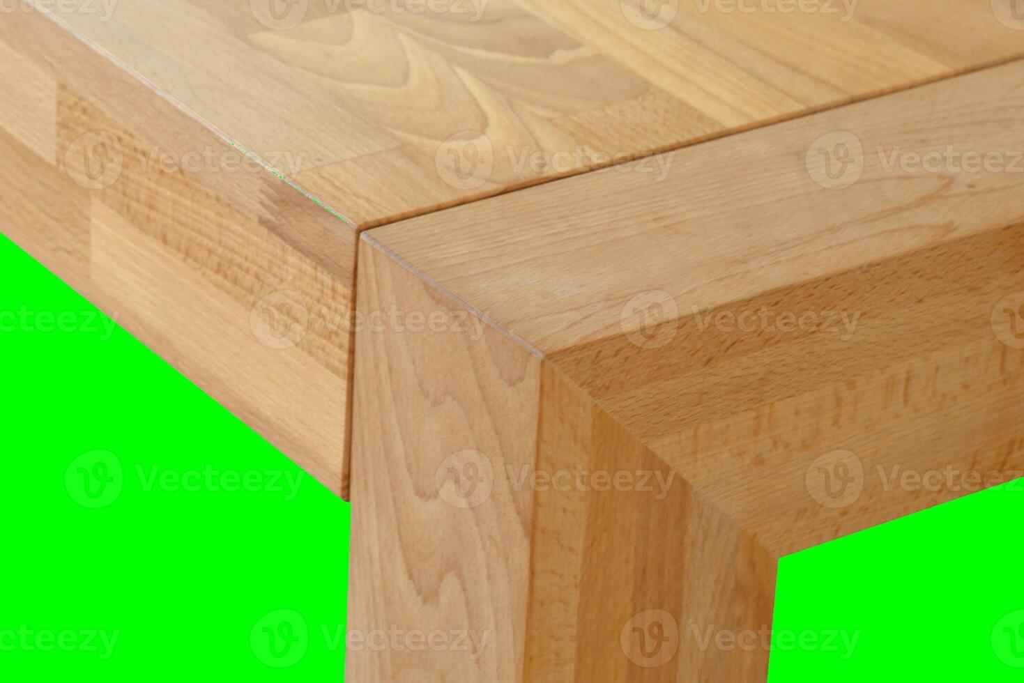 Wooden dinner table surface. Natural wood furniture close view. Table isolated over green screen chroma key background photo