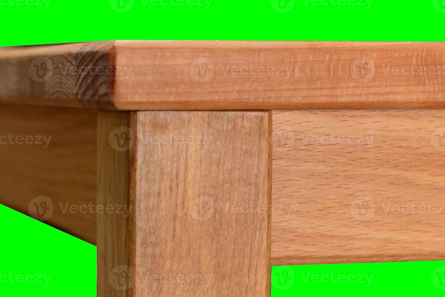 Wooden table surface. Natural wood furniture close view. Table isolated over green screen chroma key background photo