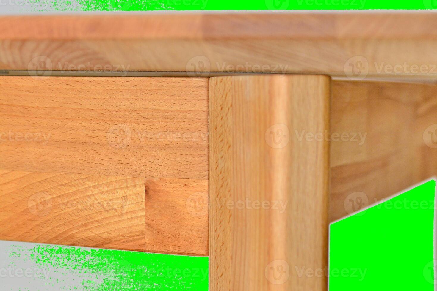 Wooden table surface. Natural wood furniture close view. Table isolated over green screen chroma key background photo