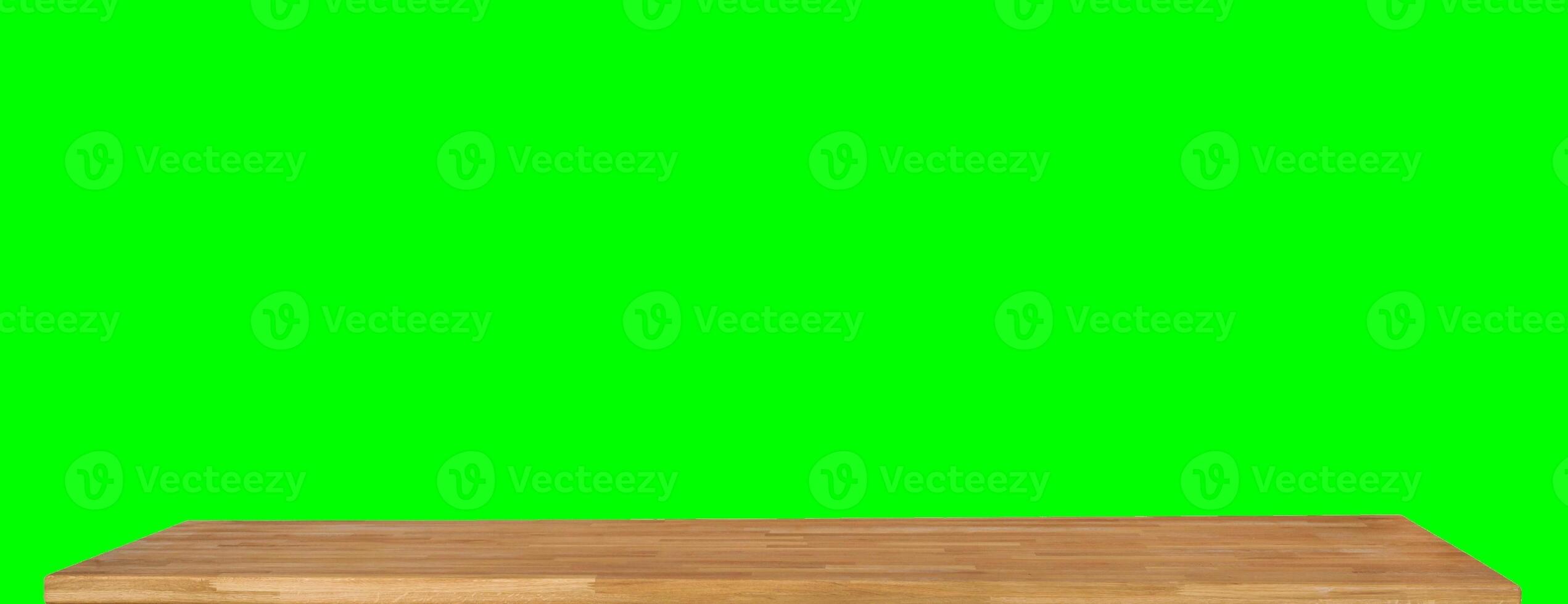Wooden dinner table surface. Natural wood furniture close view. Tabletop isolated over green screen chroma key background photo