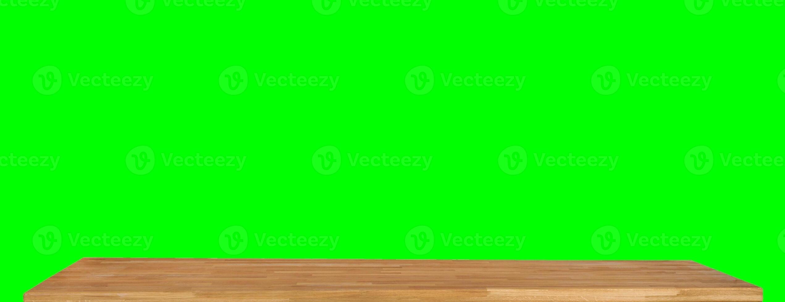 Wooden dinner table surface. Natural wood furniture close view. Tabletop isolated over green screen chroma key background photo