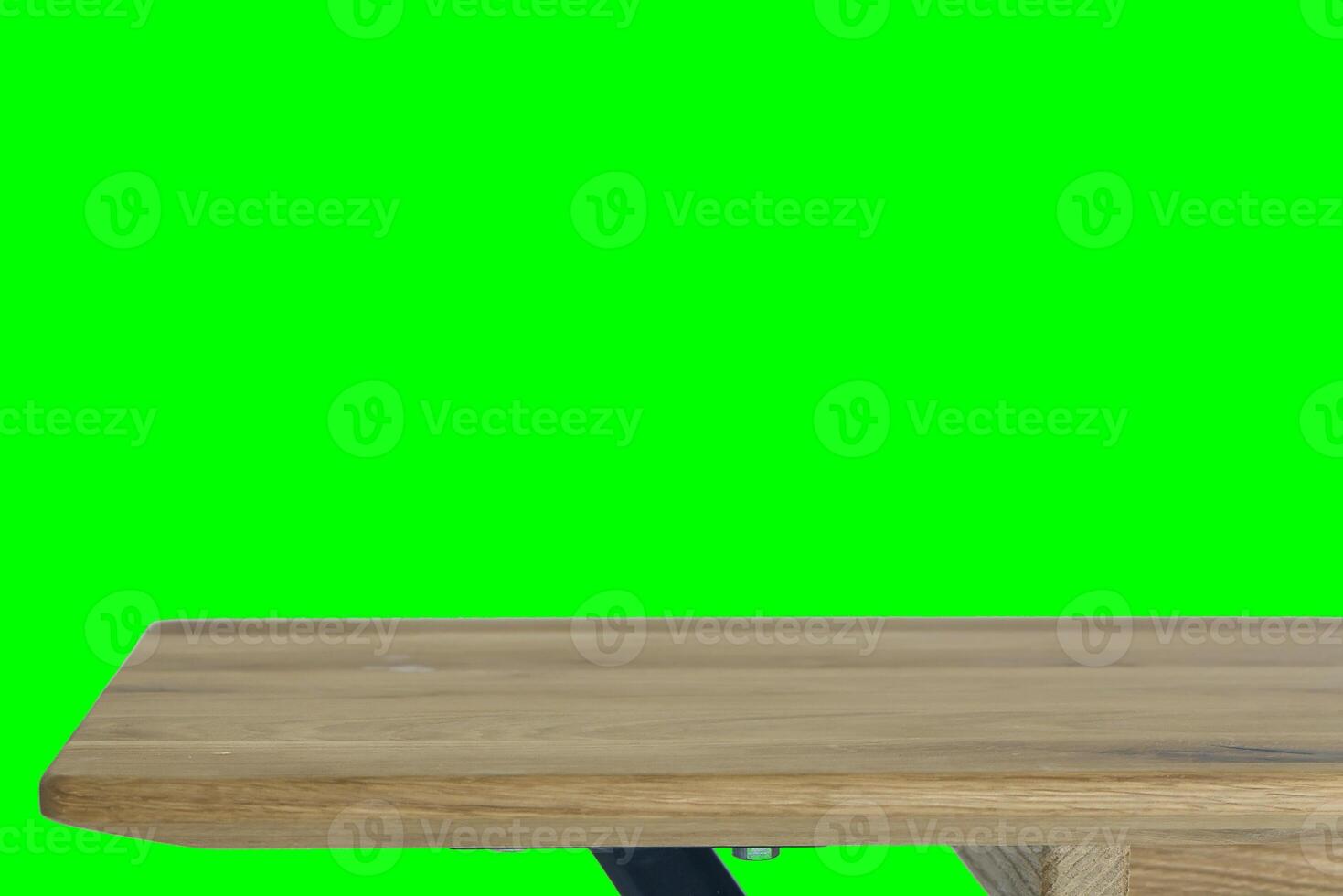 Wooden dinner table surface. Natural wood furniture close view. Table isolated over green screen chroma key background photo
