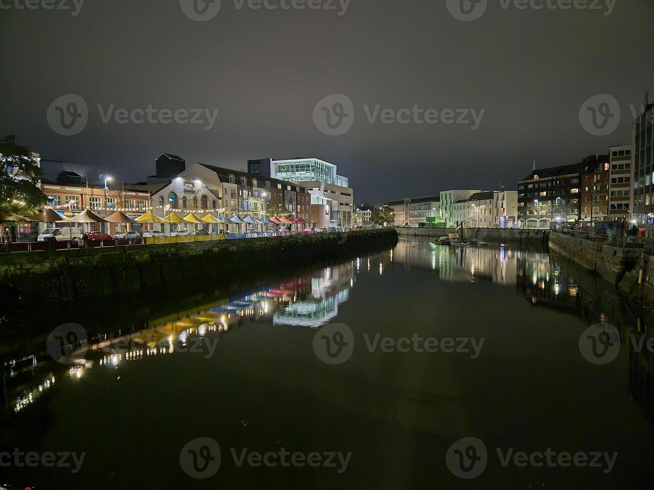 Urban Cityscape with Water and Tower Block Reflections photo
