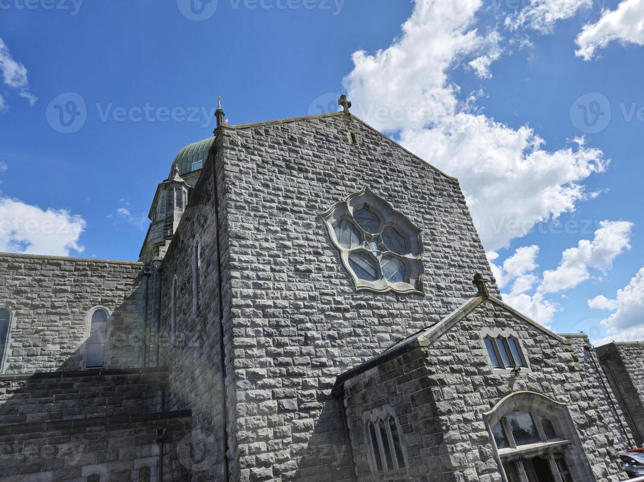 Building Window with Blue Sky and Clouds photo