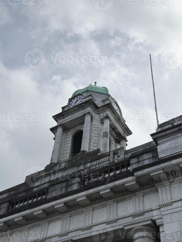 Skyline View of a Monument in a Metropolitan Area with Cloudy Sky photo