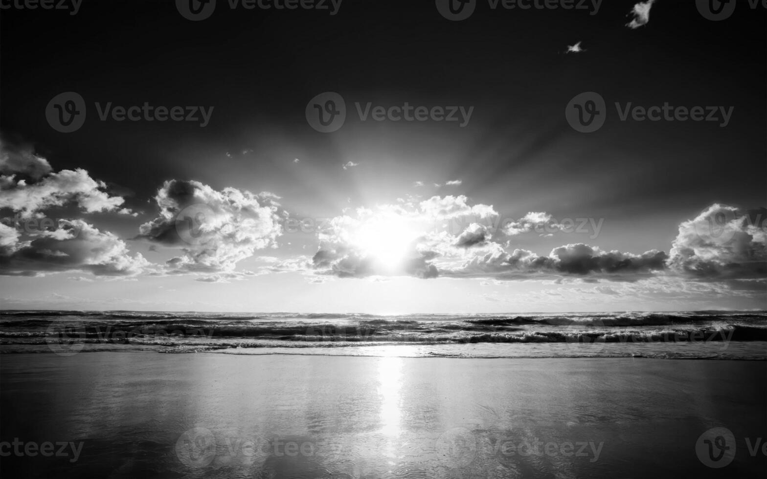 Serene Sunset Over Water A Natural Landscape with Clouds and Sunlight photo