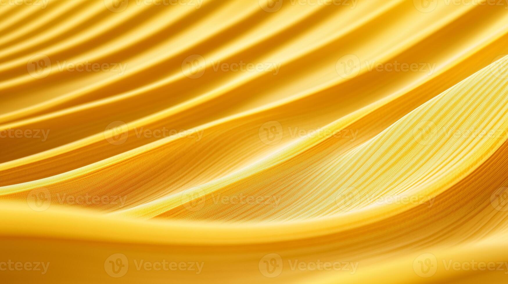 Yellow pasta sheets arranged in wavy patterns on a smooth surface under soft lighting photo
