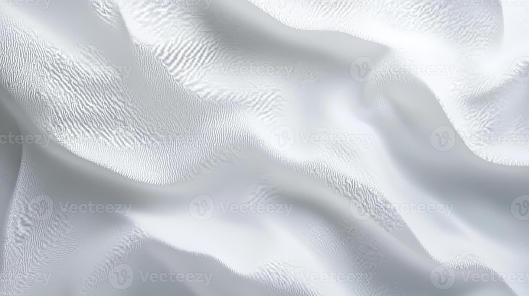 Smooth white fabric with gentle folds creating soft, flowing texture photo