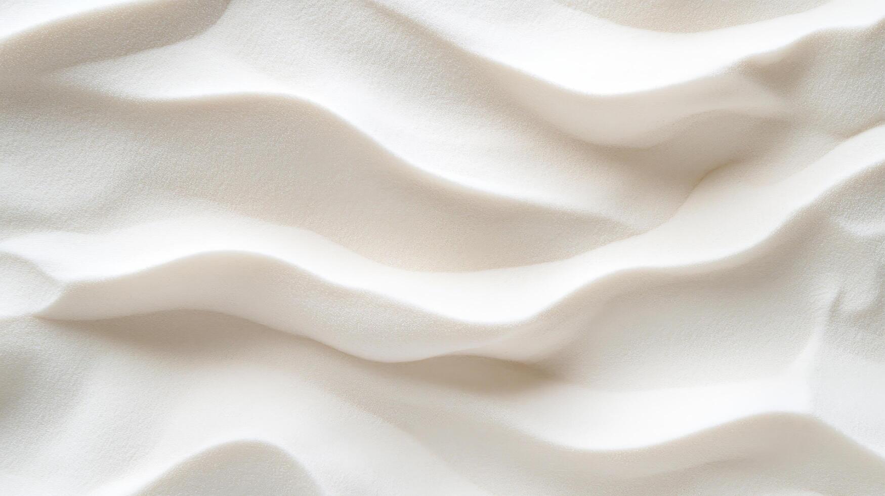 Wavy white sand texture with soft shadows creating minimalist and serene background photo