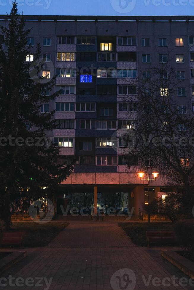 Panel, Soviet, multi-storey house in the evening in Minsk photo