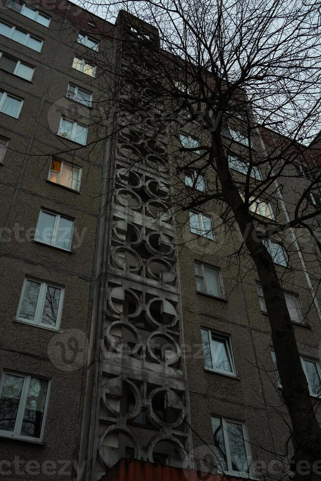 Soviet panel, multi-storey house. Minsk, Belarus. Evening depressive mood photo