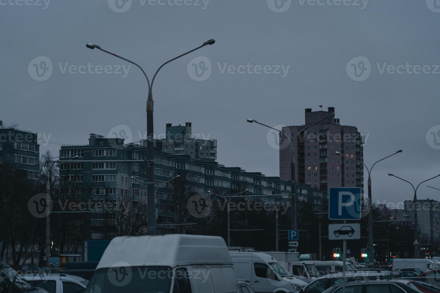 Grey, Soviet panels in the distance in the evening. Minsk in the evening photo