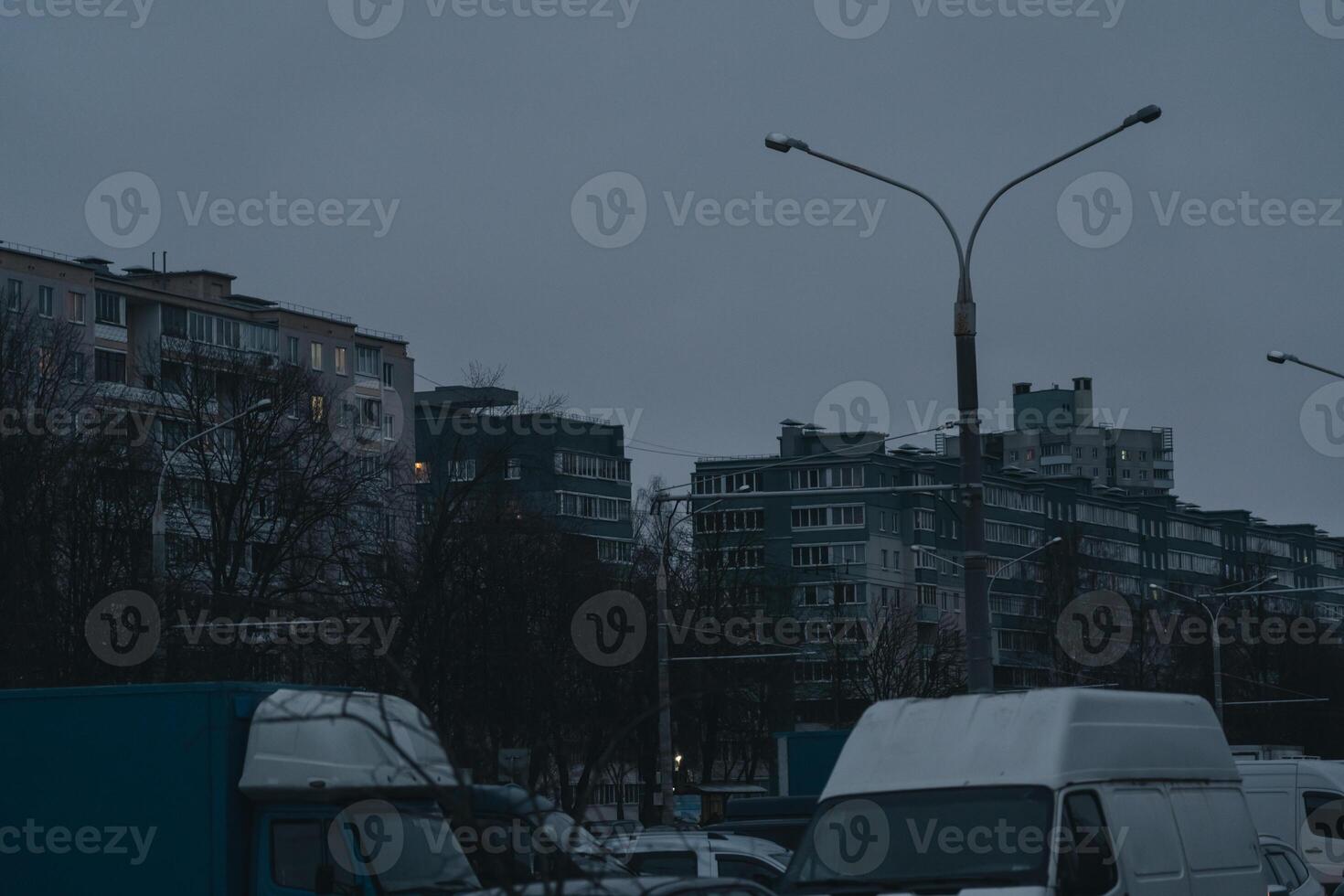 Grey, Soviet panels in the distance in the evening. Minsk in the evening photo
