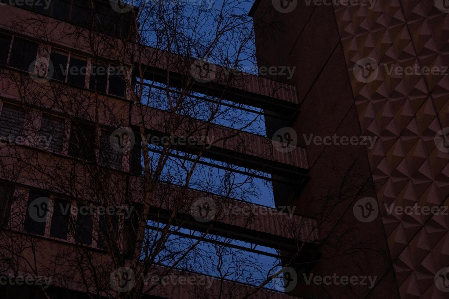 Soviet panel, multi-storey house. Minsk, Belarus. Evening depressive mood photo
