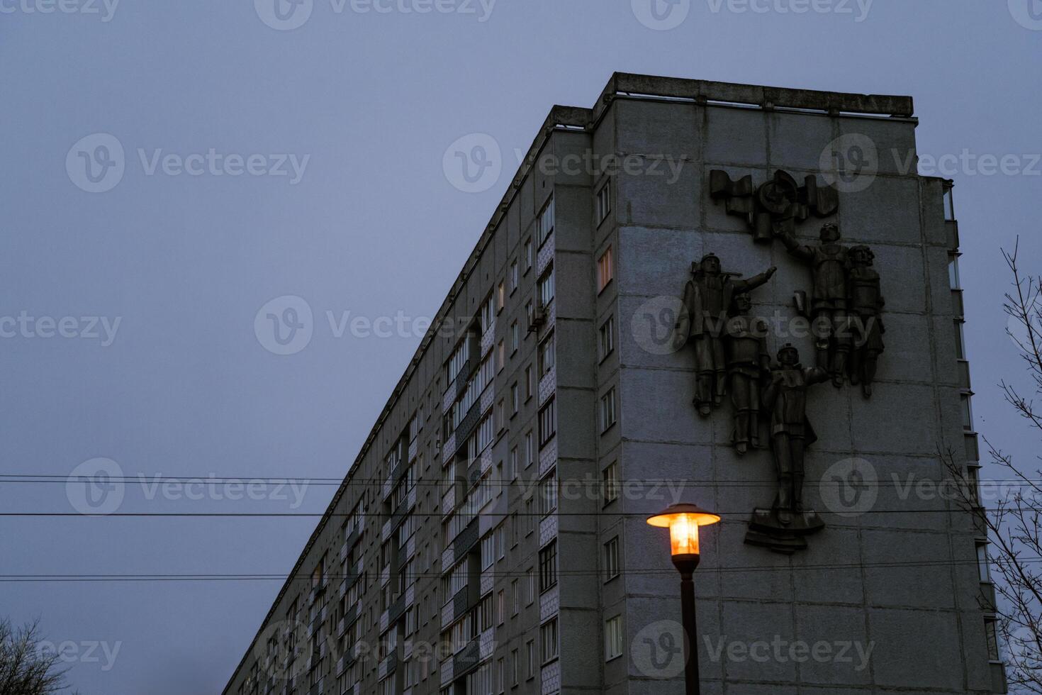 Grey, Soviet panels in the distance in the evening. Minsk in the evening photo