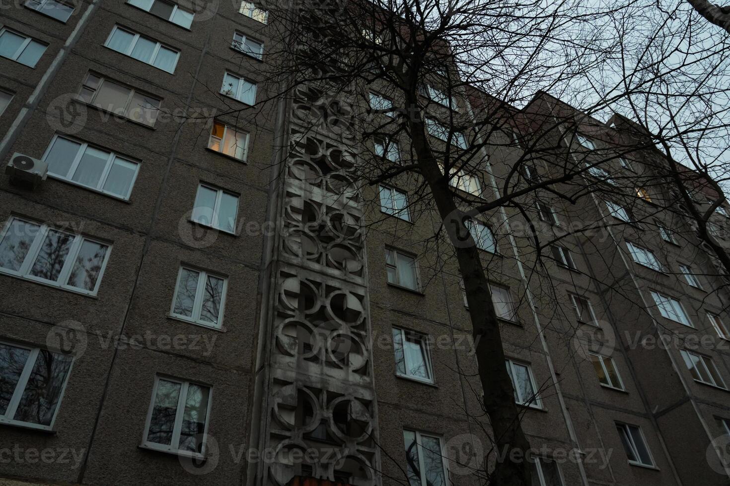 Soviet panel, multi-storey house. Minsk, Belarus. Evening depressive mood photo