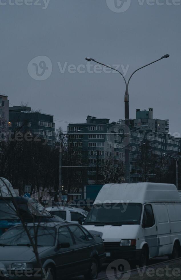 Grey, Soviet panels in the distance in the evening. Minsk in the evening photo