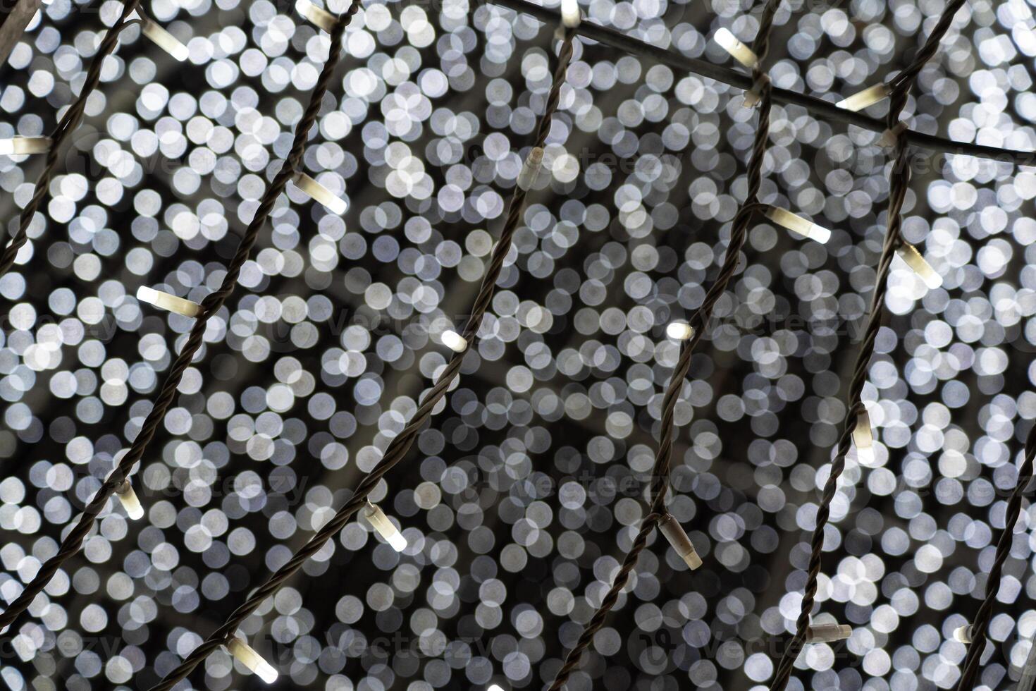 Christmas garland in close-up. The white glow of the garland photo