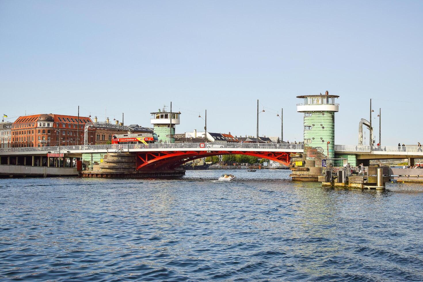 Copenhagen, Denmark. December 19, 2024. View of a bridge with old green control towers in Copenhagen, Denmark. photo