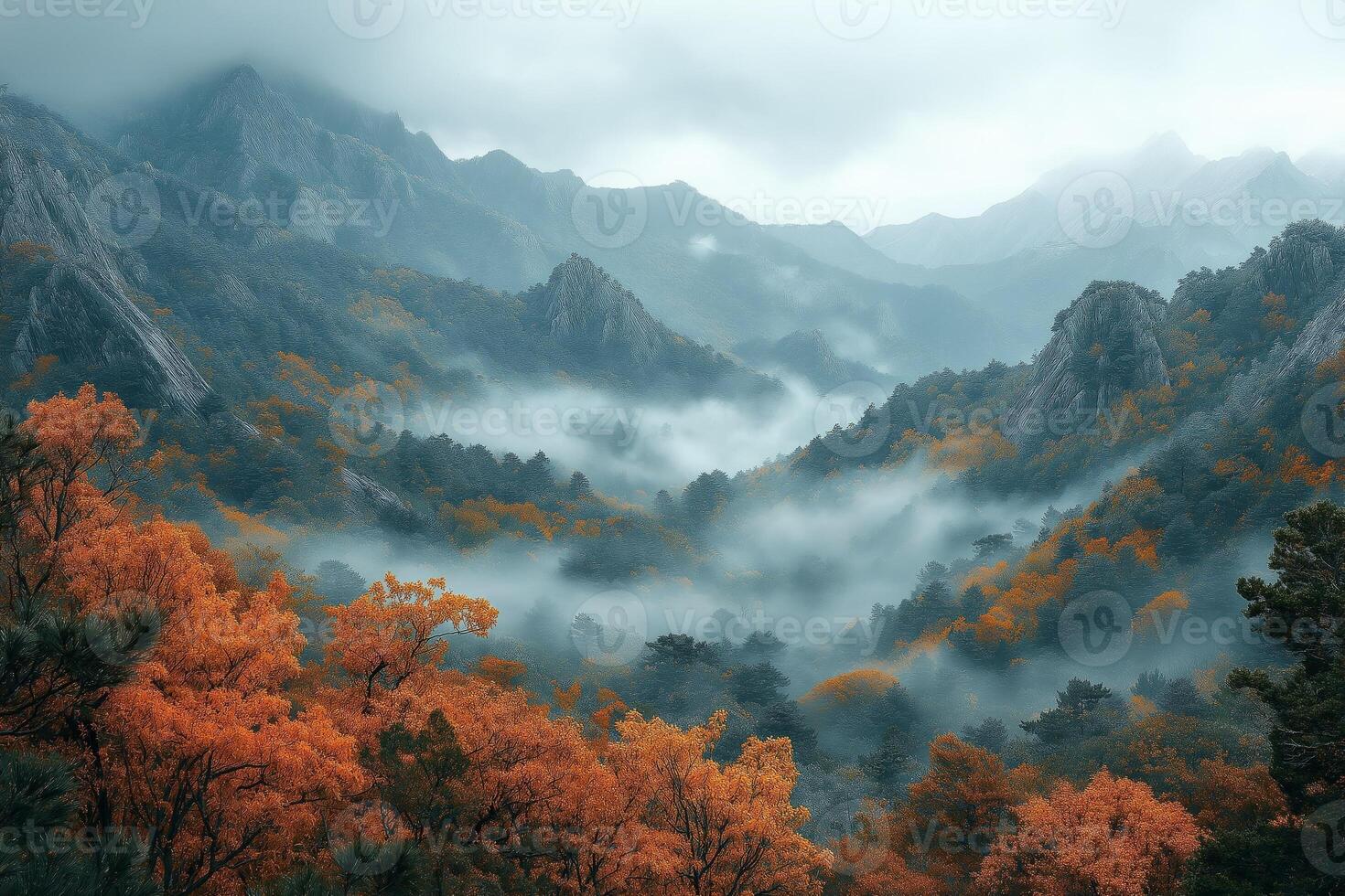 Fog rolling over majestic autumn mountains in the morning photo