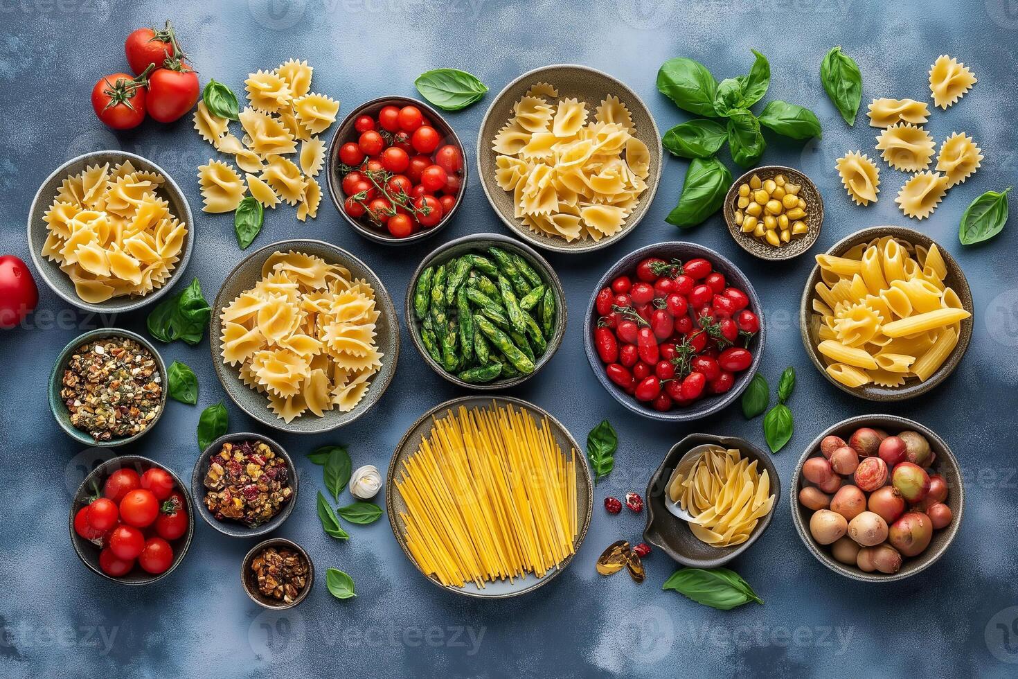 Variety of italian pasta, vegetables and spices creating a colorful culinary scene photo
