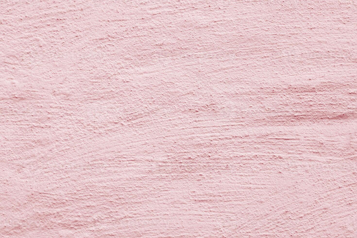 Texture of pink stucco. Designer interior background. Abstract architectural surface. photo