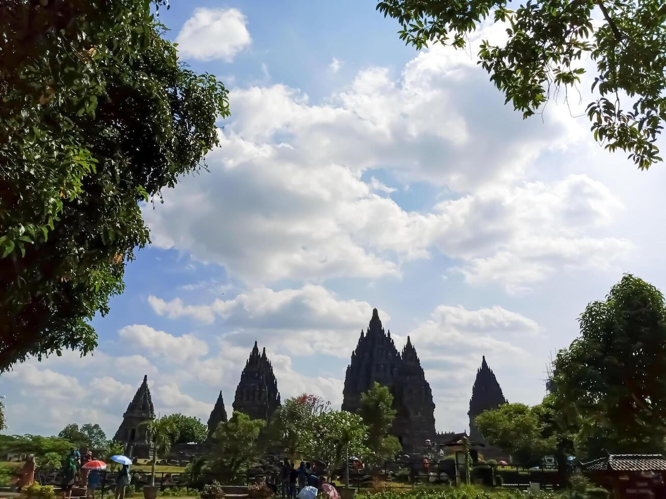 Central Java - Indonesia, July 30, 2024 The iconic Prambanan temple also called Loro Jonggrang. a UNESCO World Heritage Site, with visitors exploring the grounds. photo
