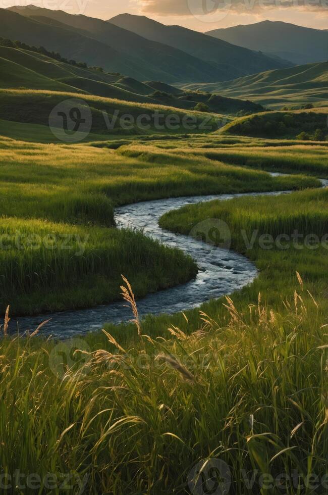 A serene landscape featuring a winding river through lush green fields and hills. photo