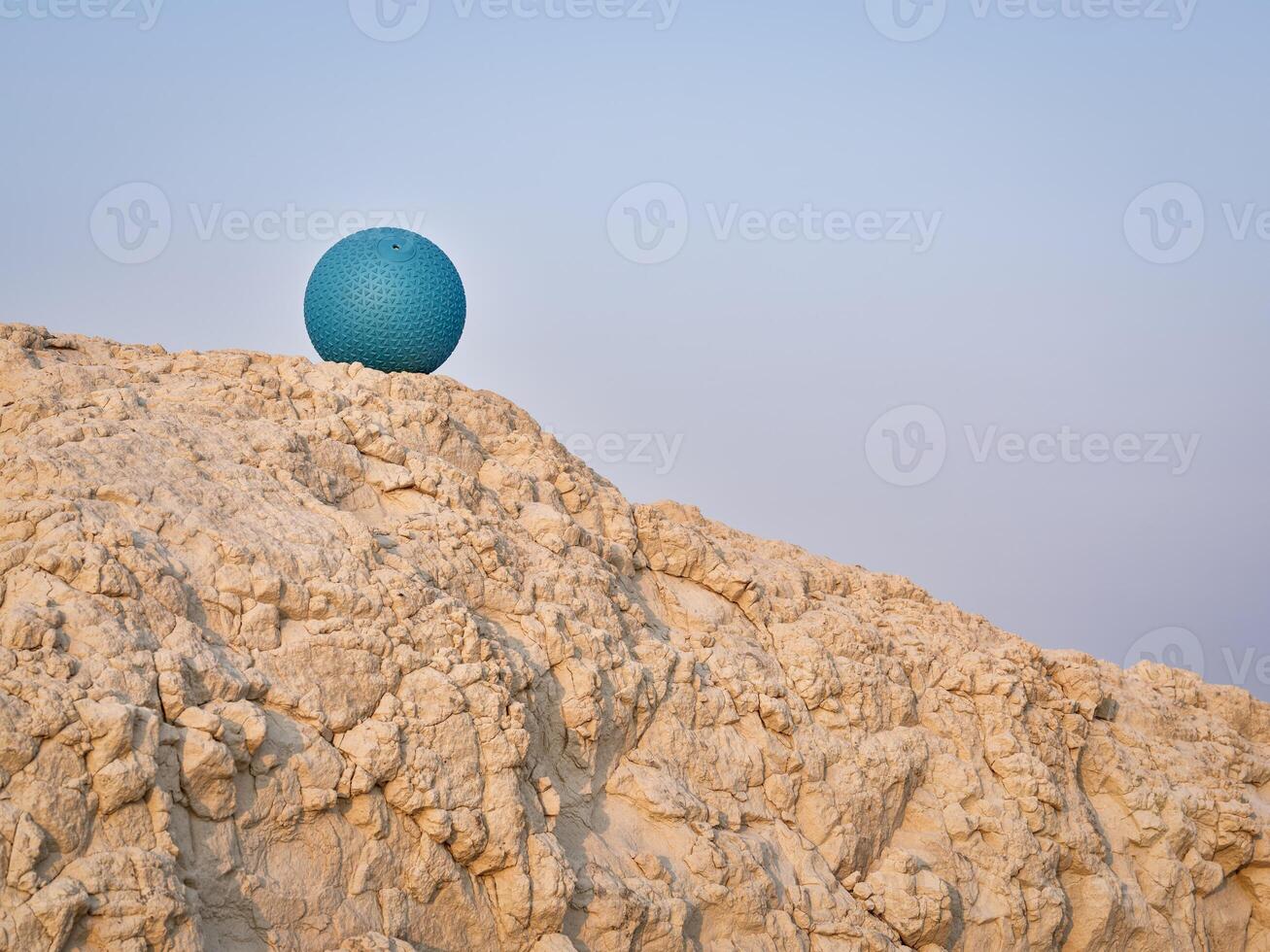 slam ball at a cliff - outdoor fitness photo