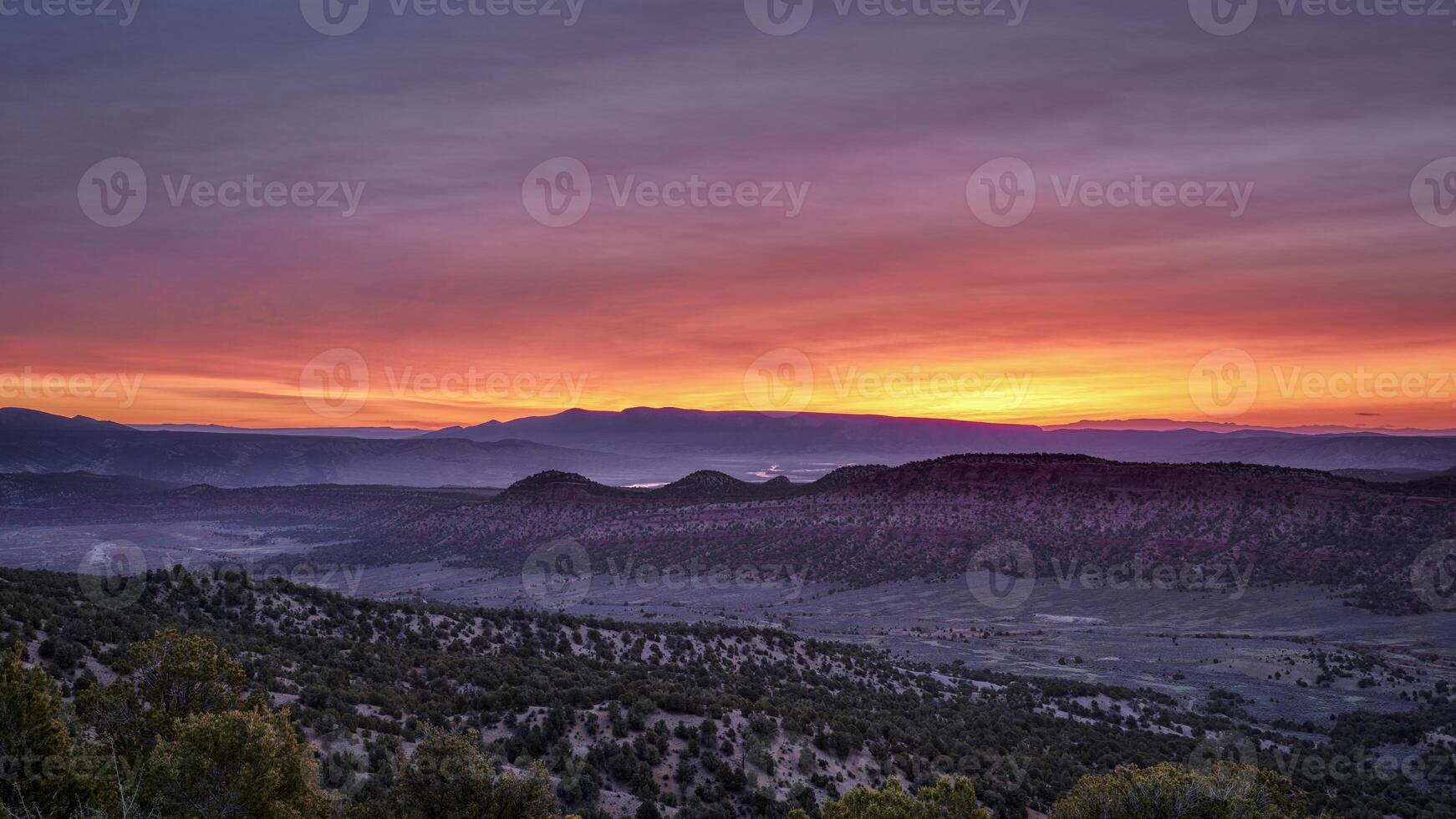 colorful sky over Yampa River at dawn photo