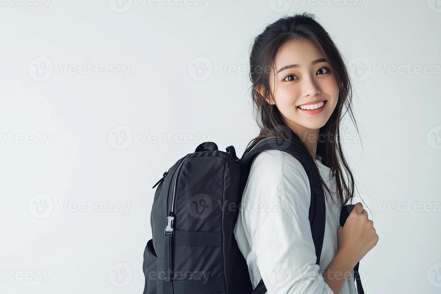 Asian woman with backpack on white background photo