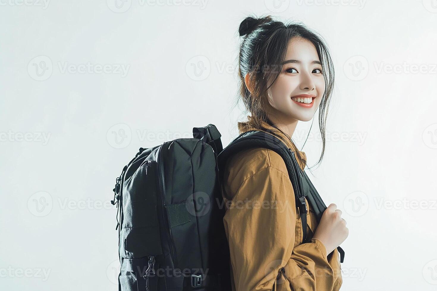 A woman with a backpack smiling photo