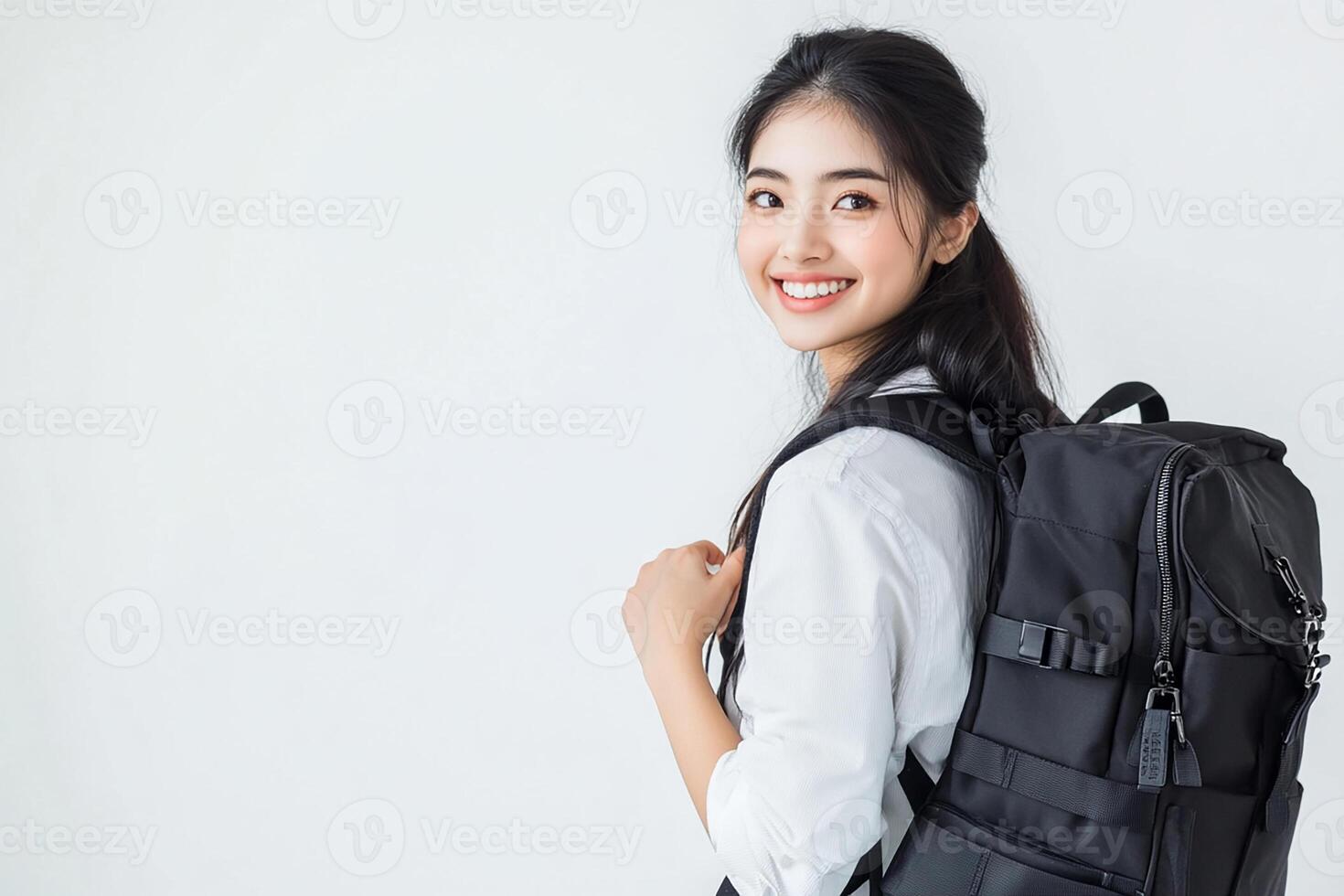 Asian woman with backpack on white background photo