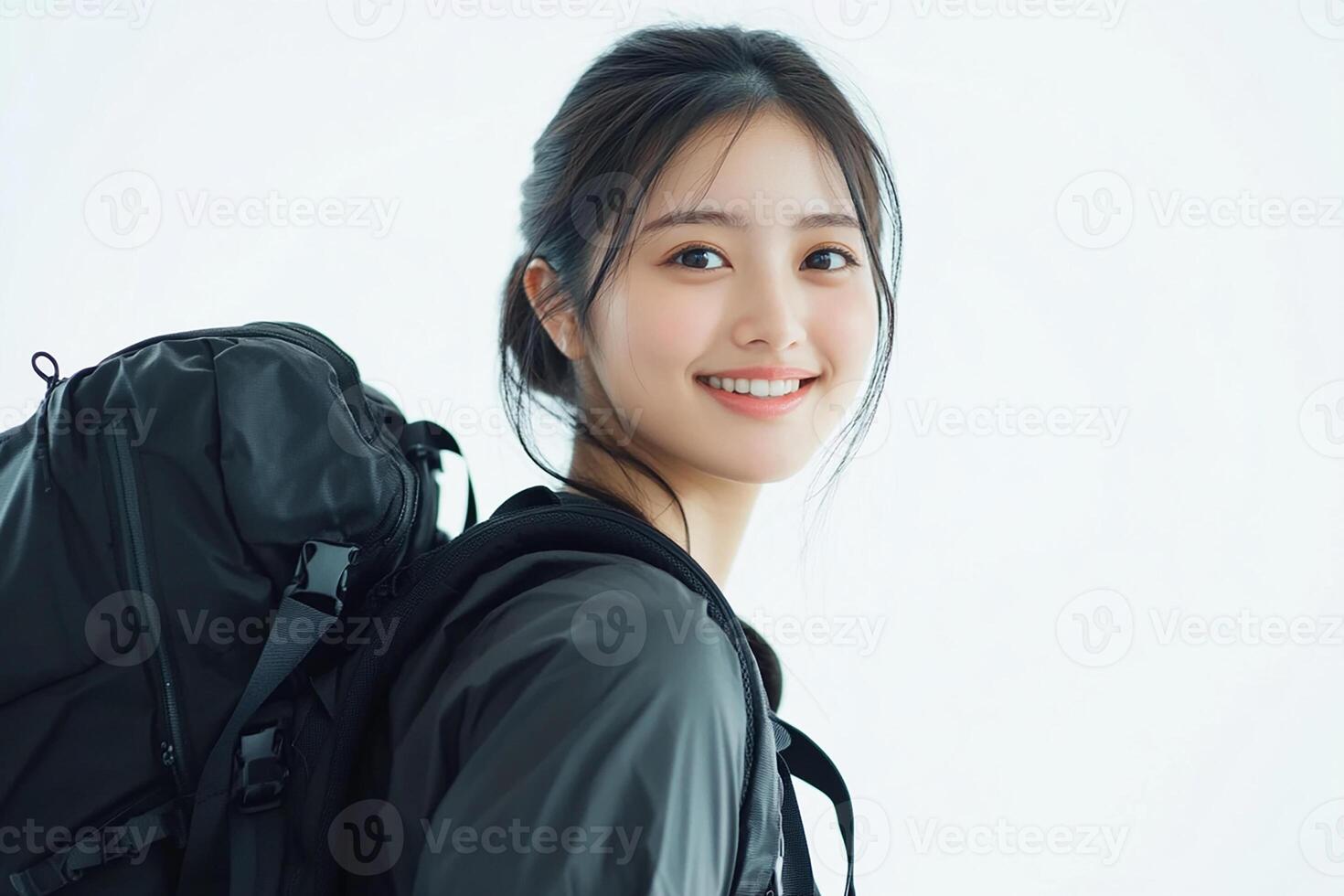 Young asian woman with backpack photo