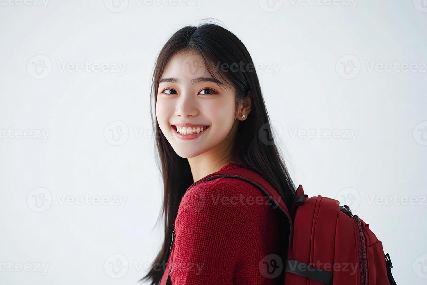 Asian woman with red sweater and backpack photo