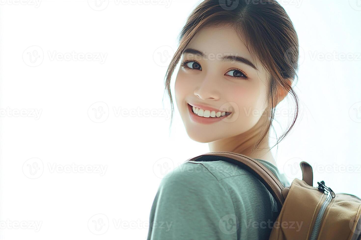A woman with a backpack smiling photo