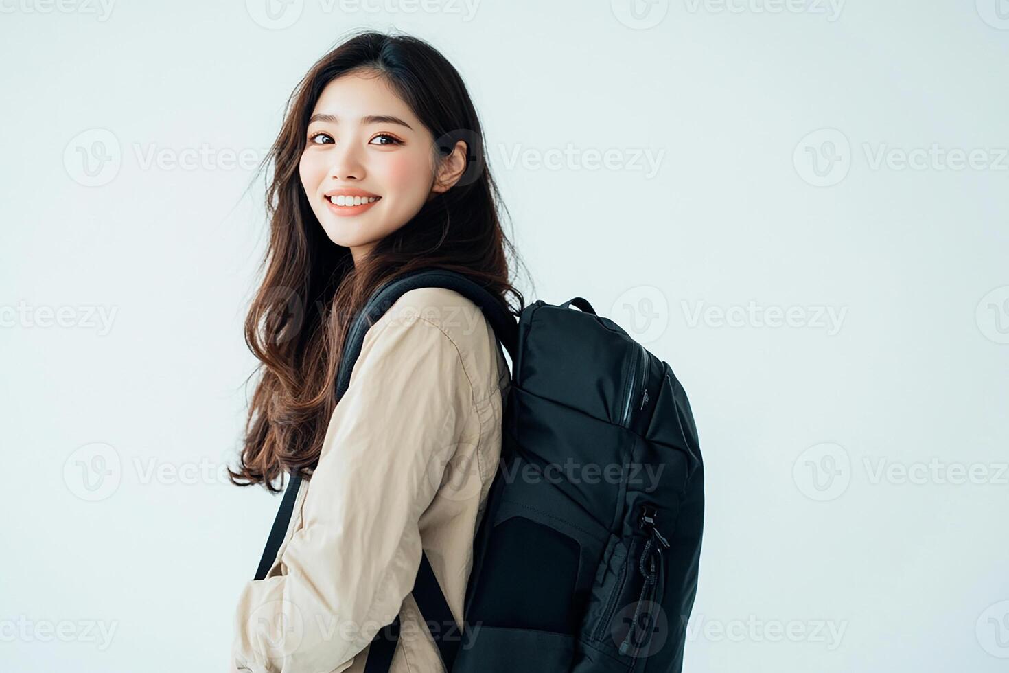 Portrait of young asian woman with backpack photo