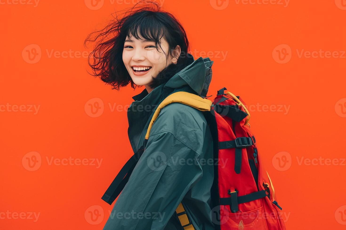 A woman with a backpack and a smile photo