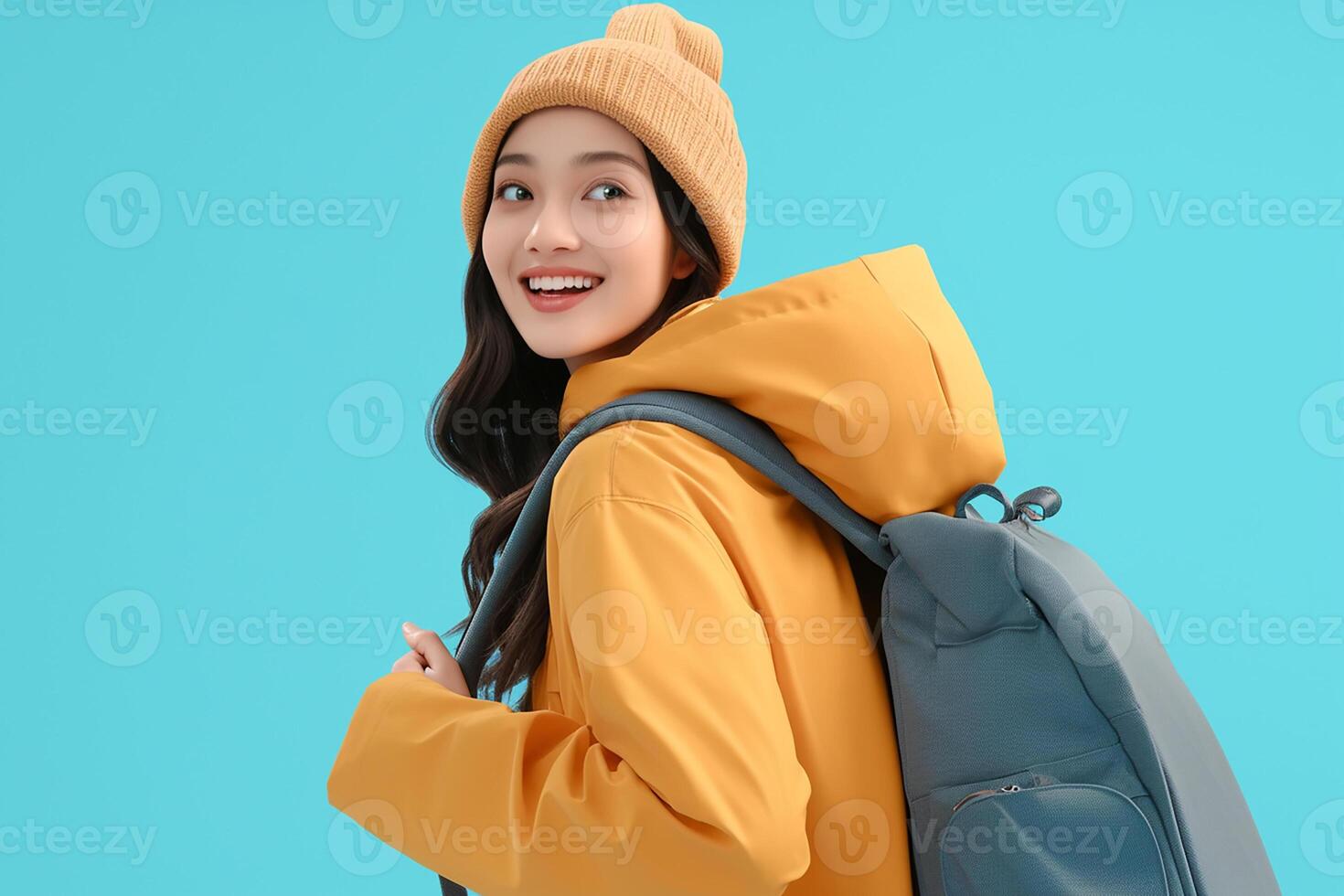 A woman in a yellow coat and hat with a backpack photo