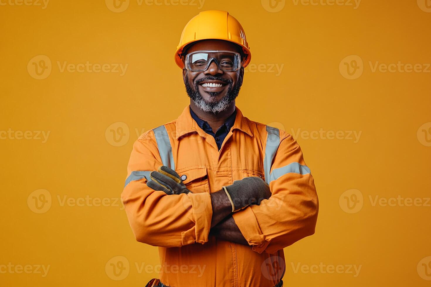 An african american man in an orange work uniform photo
