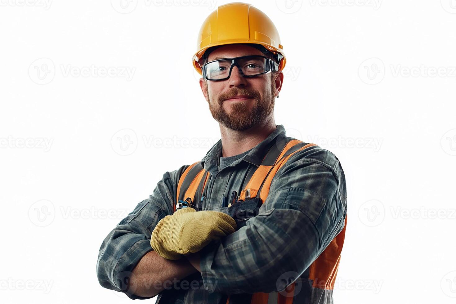 A man in a hard hat and safety glasses photo