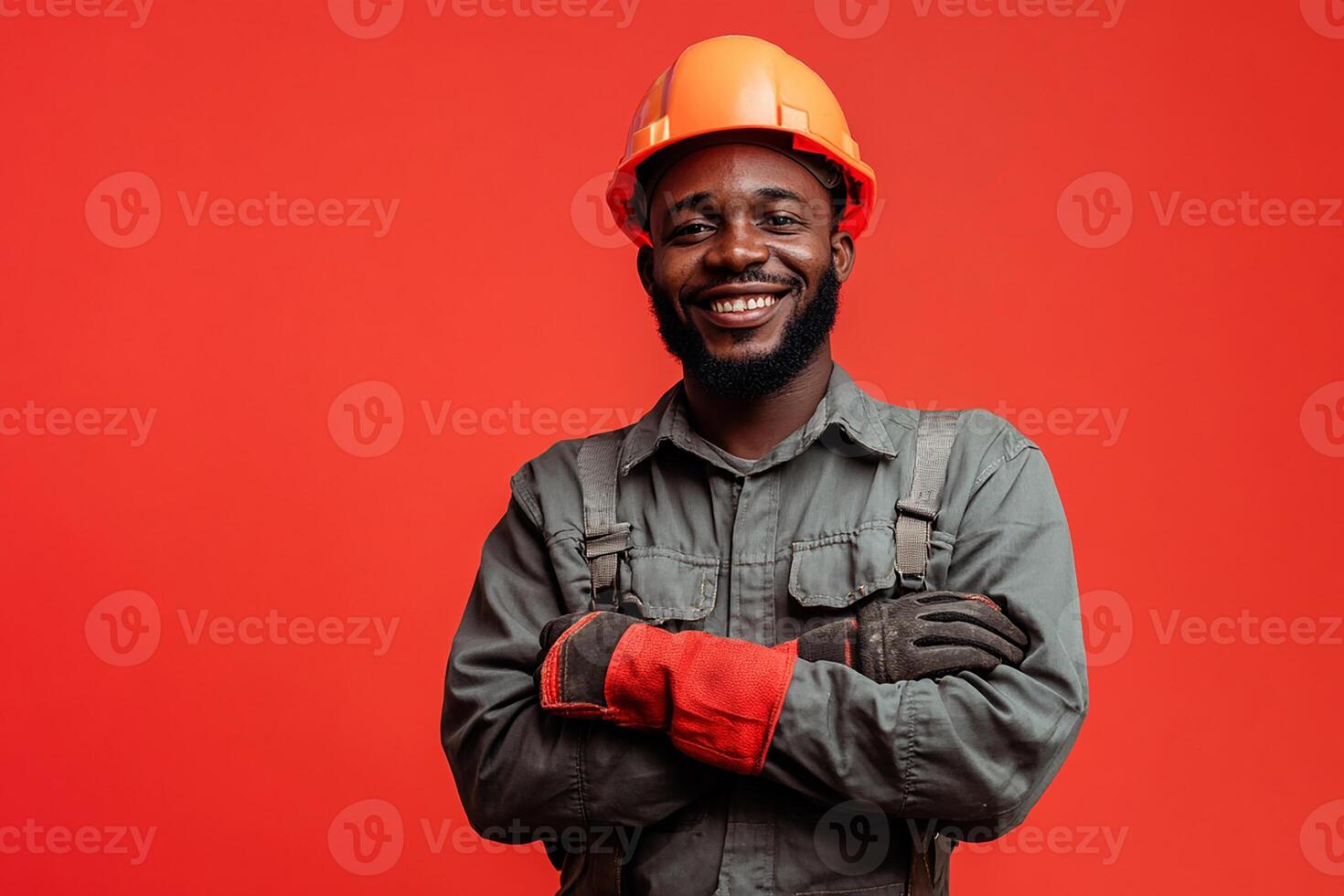A smiling black man in a hard hat and safety gear photo