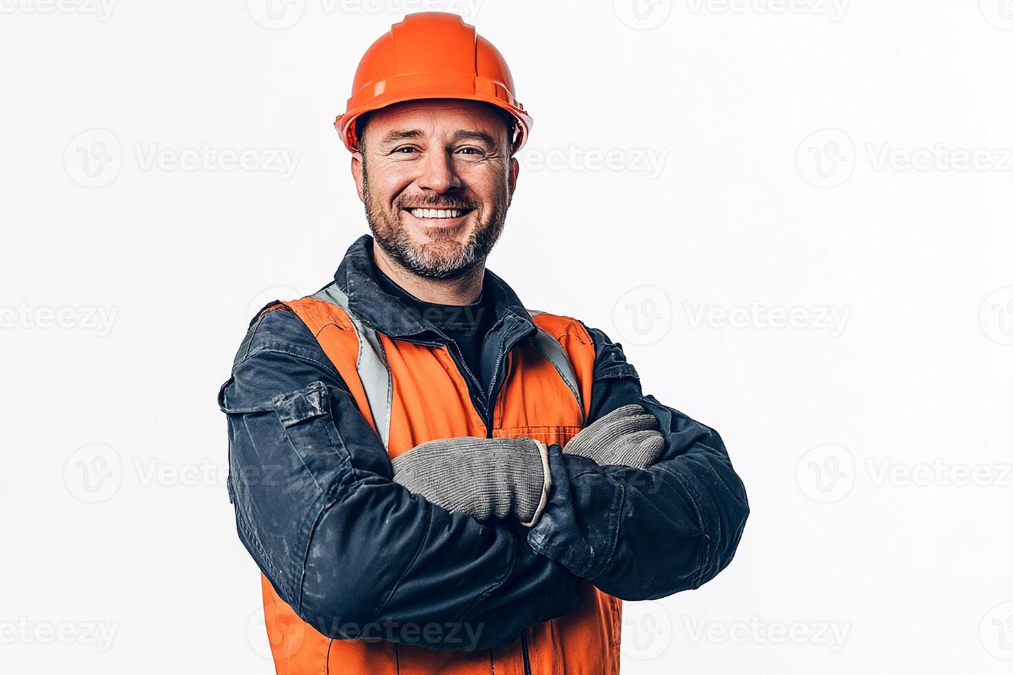 A man in an orange hard hat and orange vest photo