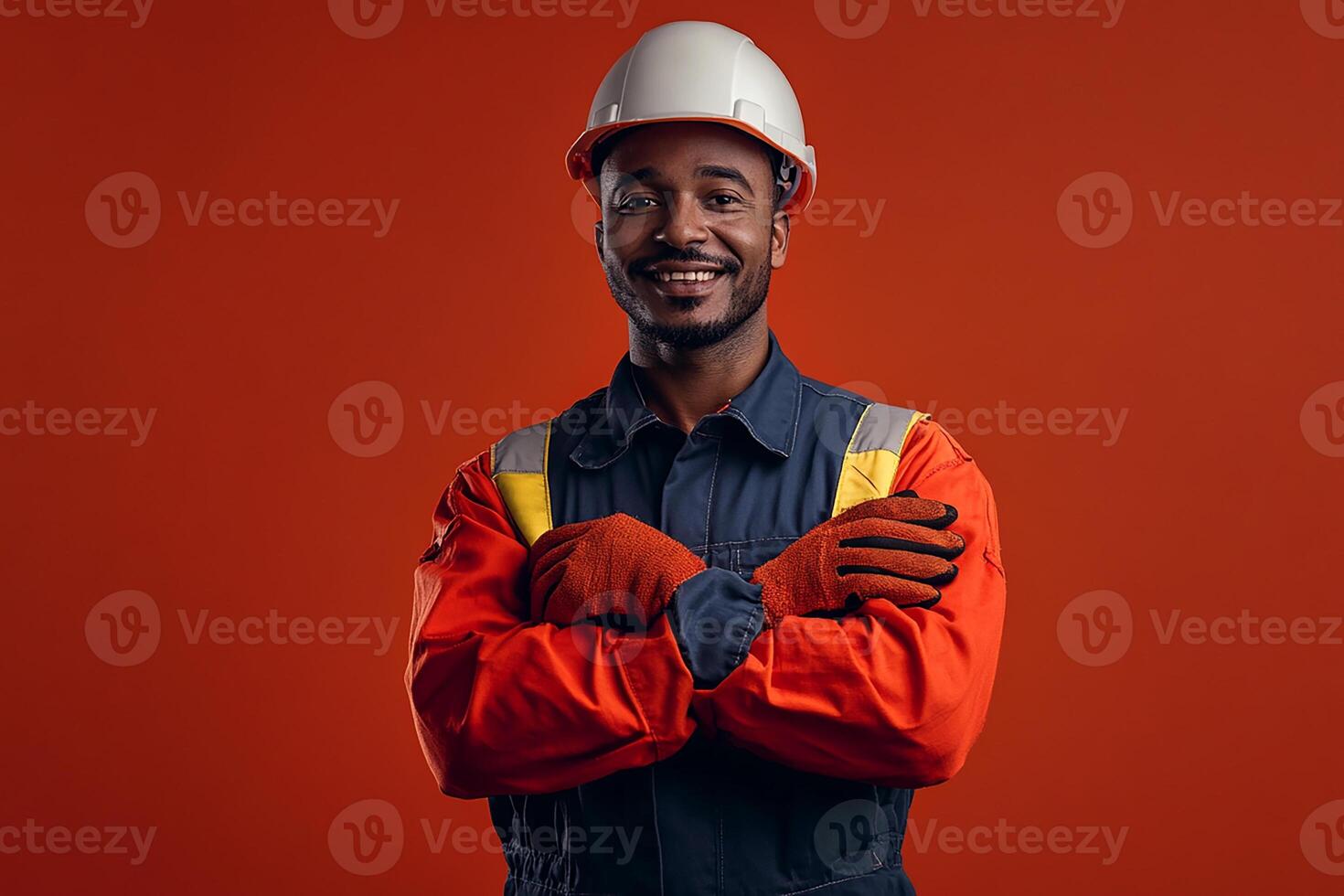 An african american man in a hard hat and safety vest photo