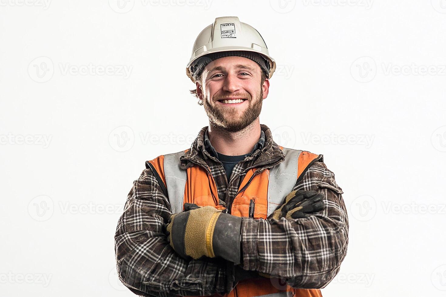 A man in an orange vest and hard hat photo
