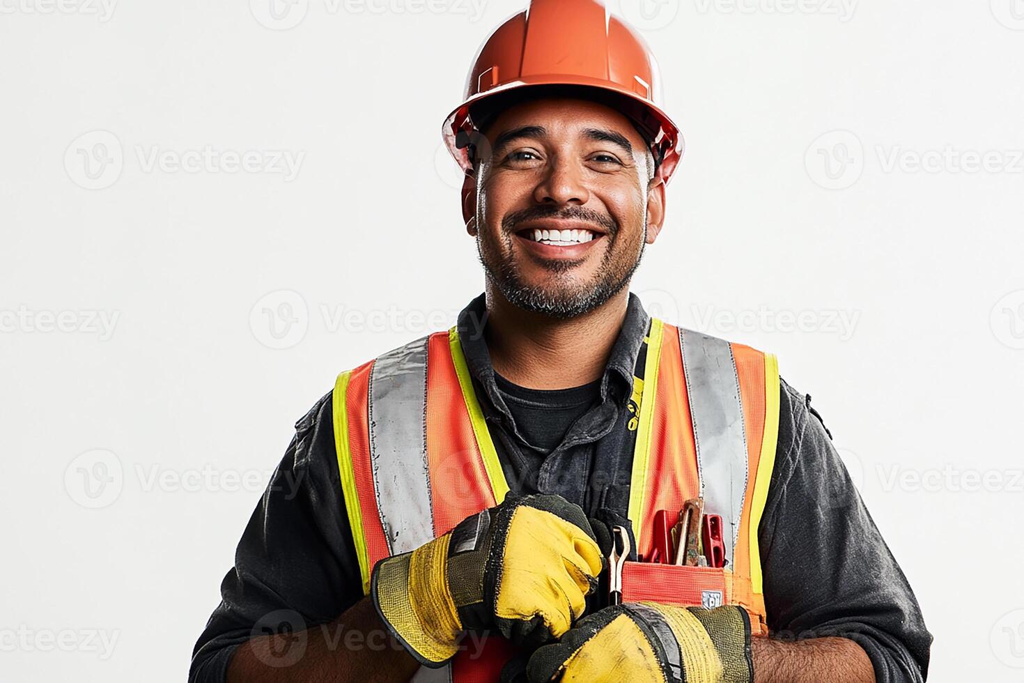 A man in a hard hat and safety vest smiling photo